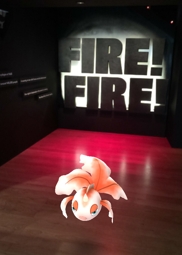 A screenshot of a Pokemon outside the entrance to the Fire Fire exhibition.