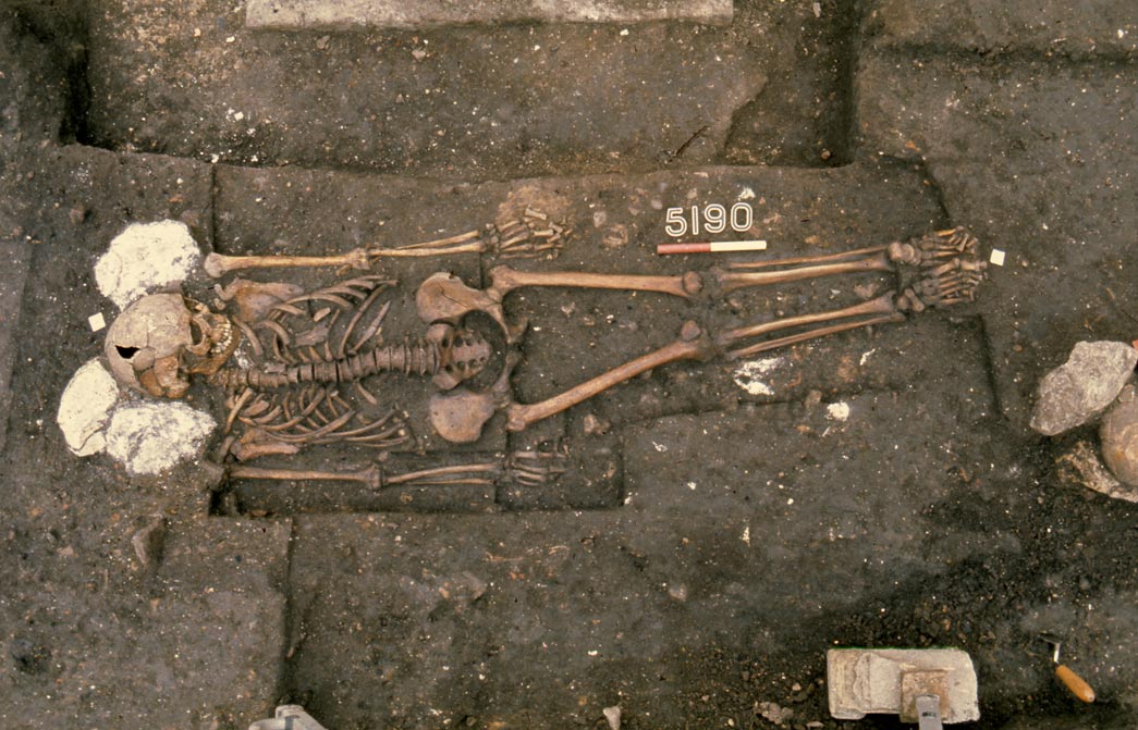 Skeleton buried with stone pillows.