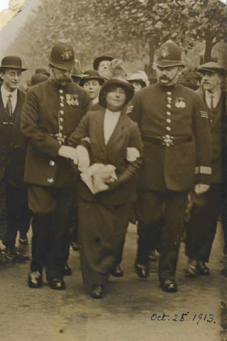 The arrest of a suffragette who had attempted to reach the royal coach during the Royal Wedding Procession, October 1913.