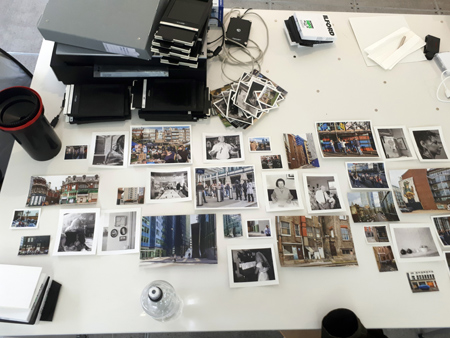 Planning the layout of photographs for display in the Magnum Live Lab.