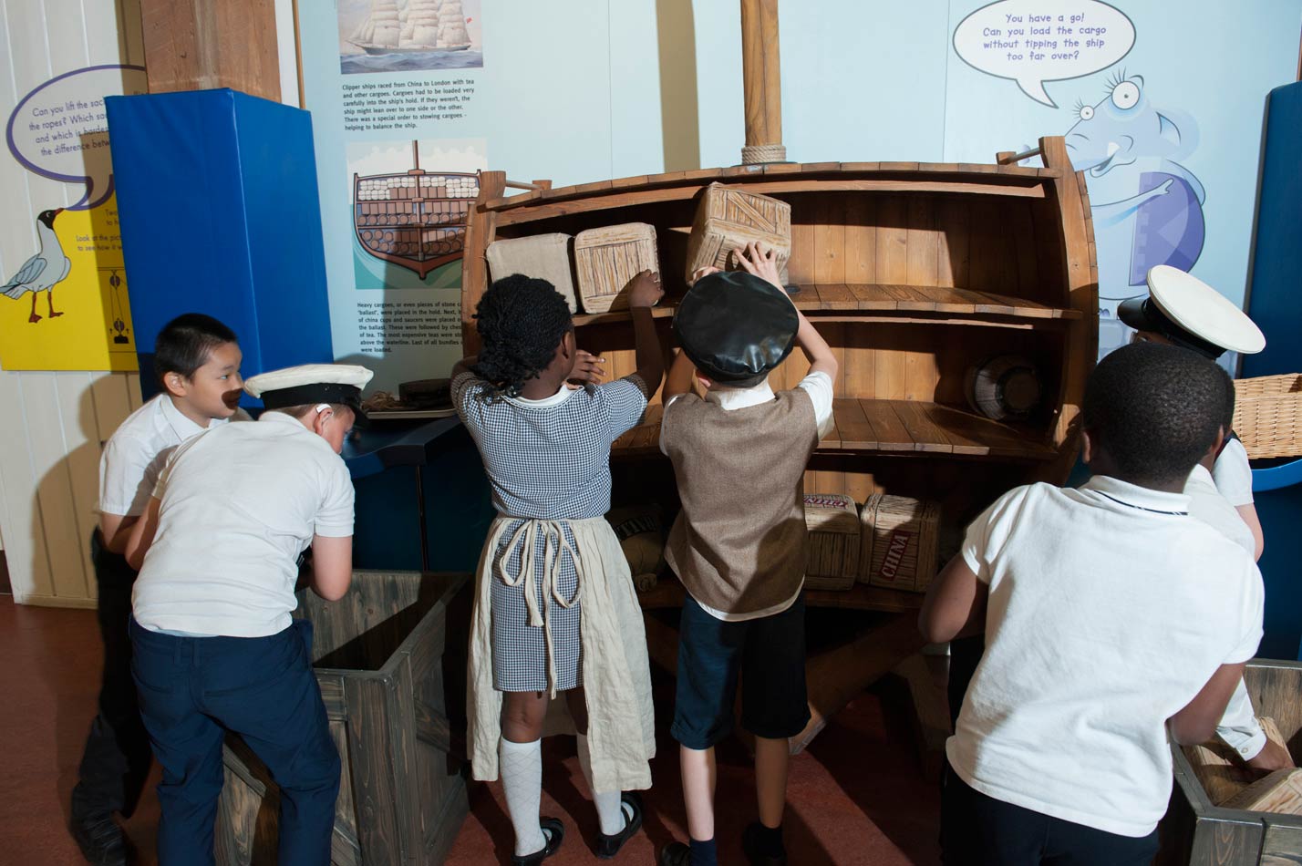 Children visiting the Mudlarks gallery play with the Tip the Clipper interactive.