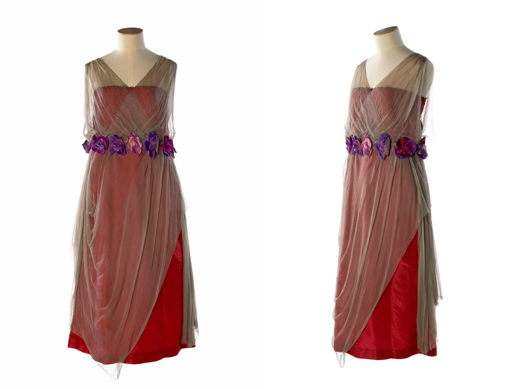 Front and side view of dress decorated with silk flowers.