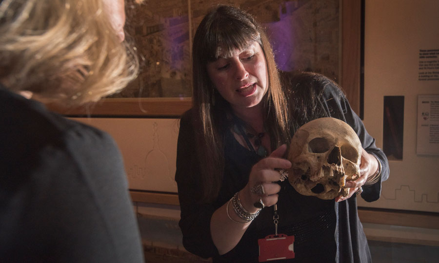 Curator Jelena Bekvalac demonstrating how the museum’s skeletal collections help us understand London’s past.