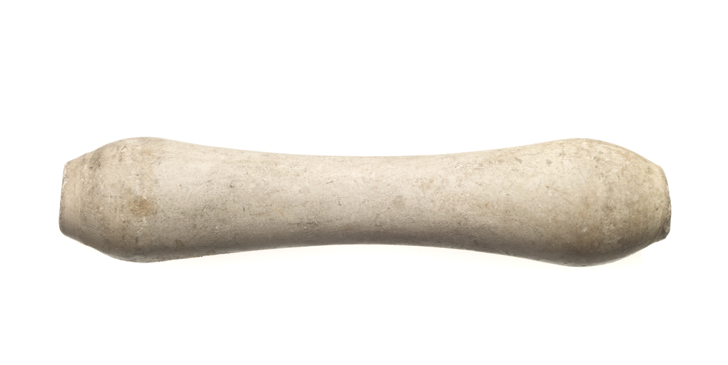 This mystery object in the archaeological object is a clay spindle with a narrow centre and flared edges,