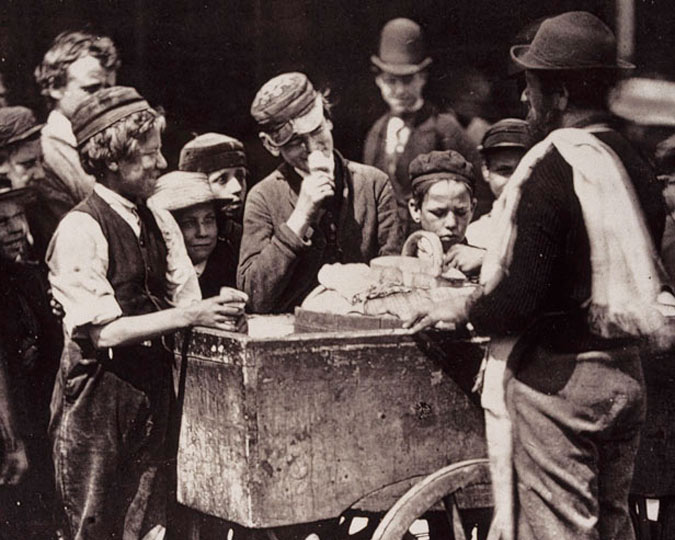 Photograph of children buying ice cream for a halfpenny.