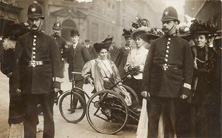 Wheelchair bound Suffragette.