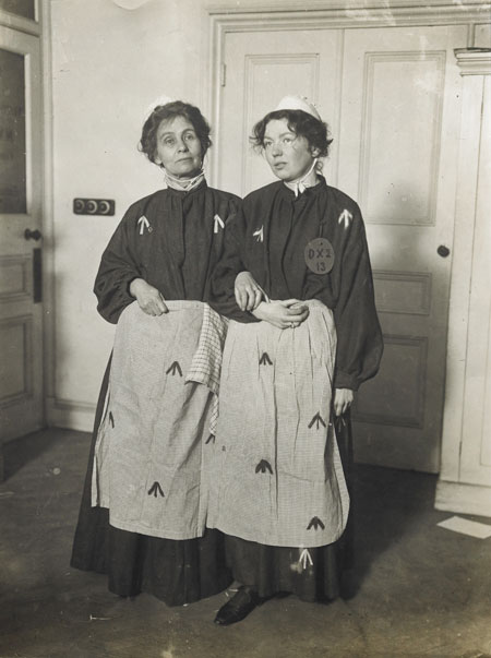 The Suffragette leaders Emmeline and Christabel Pankhurst dressed in replica prison clothing. Replica prison uniforms were often worn by ex-suffragette prisoners at demonstrations and fund-raising bazaars to highlight the conditions under which imprisoned Suffragettes were held.