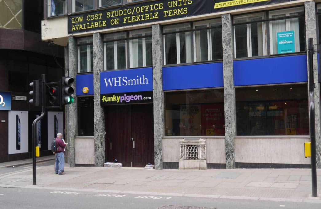 The London Stone in 2012 on Cannon Street, in premises then occupied by WH Smith. Photograph by John O'London.