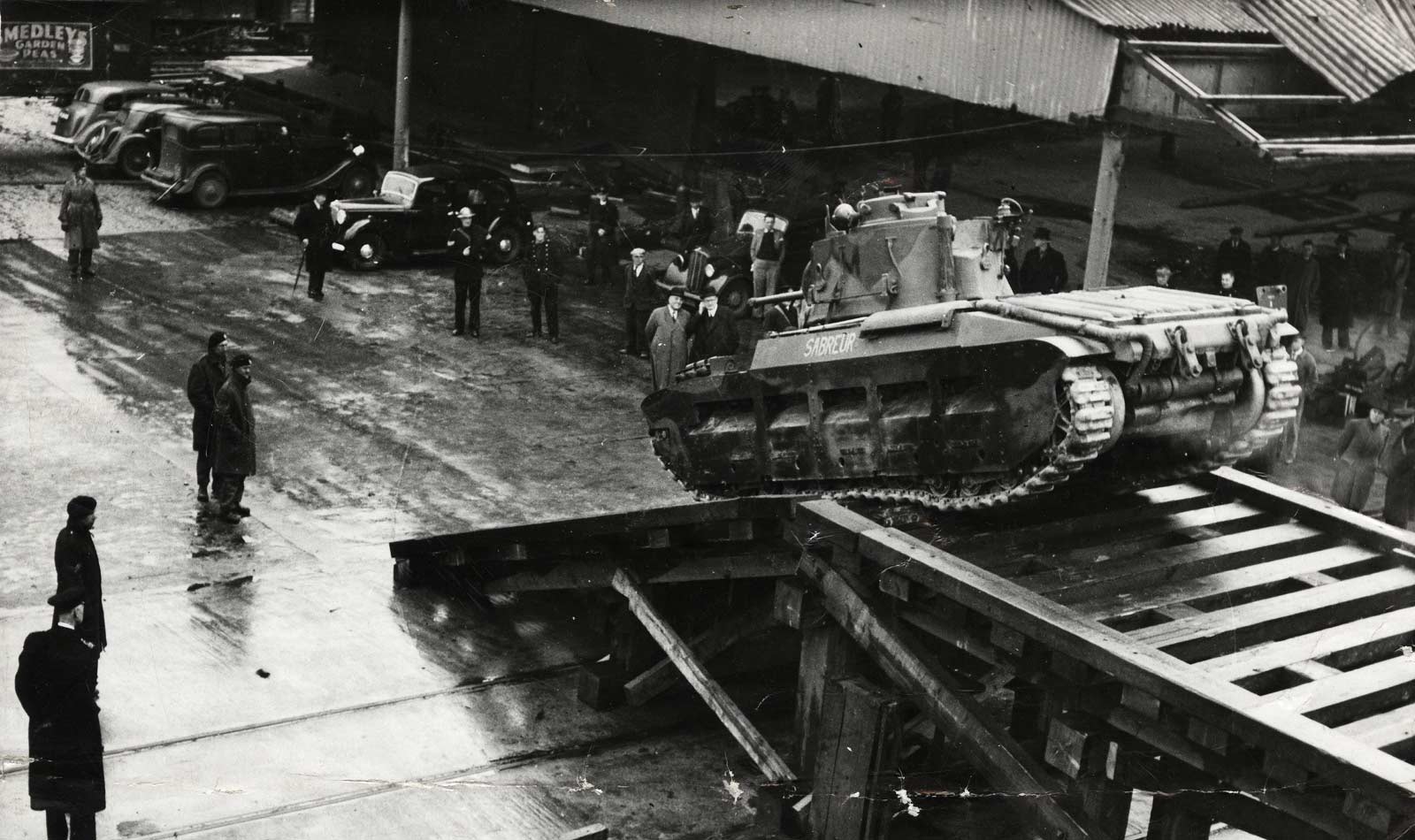 Tanks being embarked onboard ship at the Port of London, ready for the D-Day invasion. Copyright PLA Archive/Museum of London.