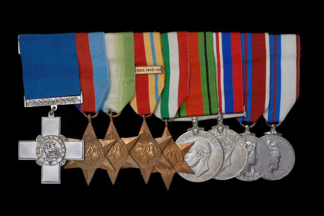 The medals of Richard Moore, including his George Cross at the front of the selection.