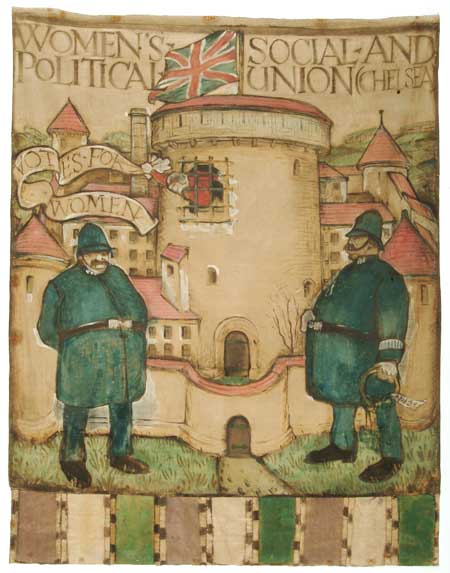 This banner was designed for the Chelsea branch of the Women's Social and Political Union (W.S.P.U) by Herman Ross. It was first unfurled at the Queen's Hall on 17 June 1908 in preparation for Women's Sunday on 21 June. The painted banner depicts two policemen guarding the entrance to Holloway prison, out of which a suffragette prisoner can be seen waving a banner with the slogan 'Votes for Women'. The base of the banner is decorated with the W.S.P.U's colours: purple, white and green. By 1911 the Chelsea branch of the union had opened a shop at 308 King's Road for the sale of suffragette merchandise. The shop's basement became a workshop for the design and production of campaign banners.