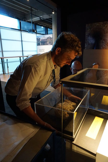 Andy Holbrook removes fatberg from its display.