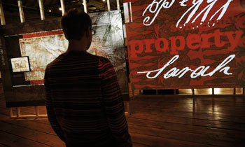 A visitor looks at a display in the London, Sugar & Slavery gallery