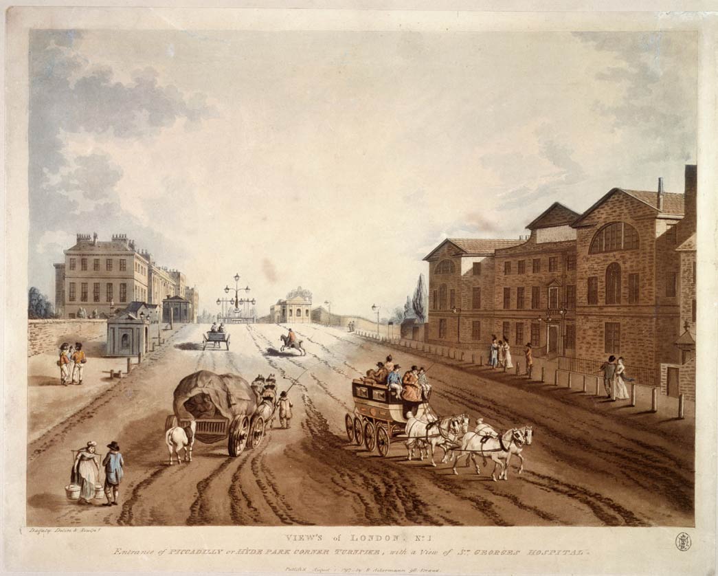 Coloured aquatint with engraving. Street scene showing wagons and a carriage on a very muddy road. Houses in Piccadilly are on the left and the hospital on the right. The turnpike gates can be seen in the middle distance.