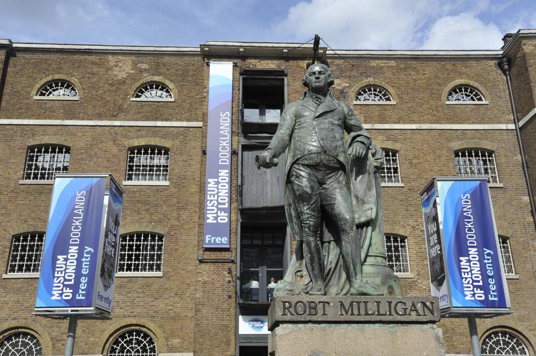 The entrance to the Museum of London Docklands, and statue of slaveholder Robert Milligan.