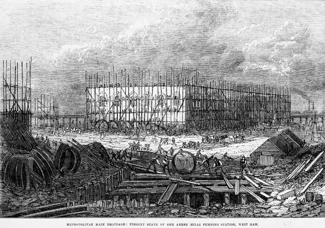 'Metropolitan main drainage: present state of the Abbey Mills pumping station, West Ham.' Exterior view of construction work on drainage and sewers. From the Illustrated London News.

