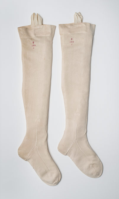 Pair of boots worn by Albert Edward, later King Edward VII (1841-1910) first son of Queen Victoria, later King Edward VII (1841-1910) when a child. The lining of the boots is inscribed ‘P Wales’.

