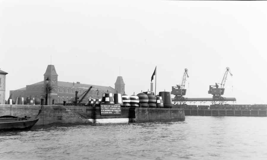 Buoys lined up along a quayside in 1948 © PLA Collection.