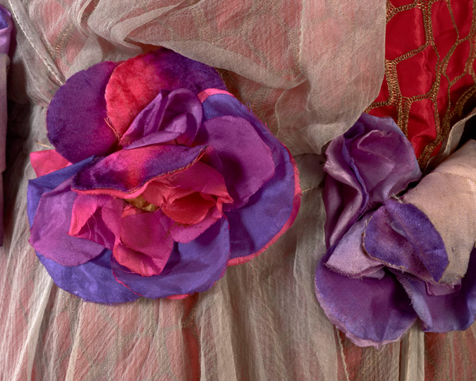 Detail of silk flowers on a dress donated by Beatrice de Cardi.
