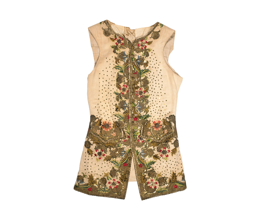 This waistcoat is decorated with a fashionable flower pattern embroidered in coloured silks and gold and silver thread. The 18th century book 'Plain Reasons for the Growth of Sodomy in England' attributed a supposed increase in homosexuality to men's dress. The author claimed that garments like this waistcoat were effeminate.