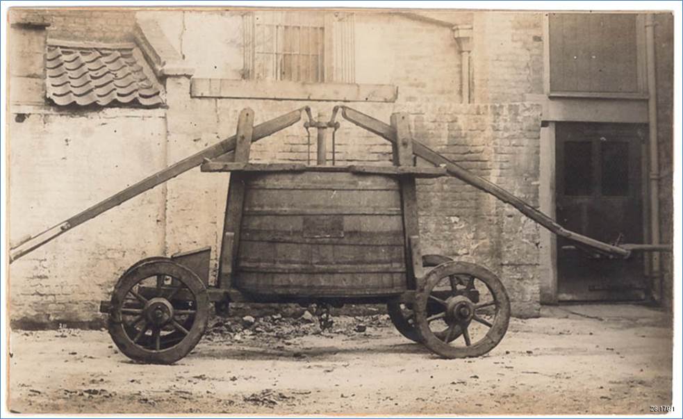Victorian photograph showing the original 17th century fire engine in working order.