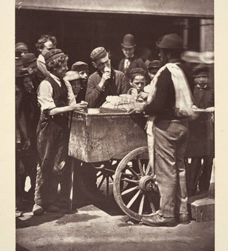 A street vendor selling 'half penny lick' ices, c.1877. (ID no.: NN29451/7b)