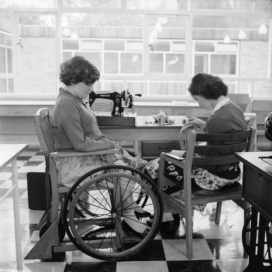 Two pupils concentrate on their sewing work at the Franklin D Roosevelt School in 1957. (ID no: HG1792/15, ©Henry Grant Collection/Museum of London)