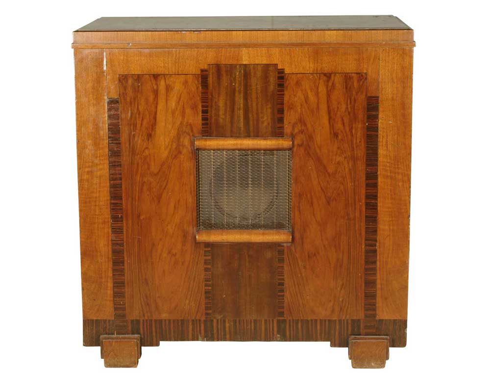 Combined television and wireless set. This home entertainment centre combines a radio with a television set. The casing was designed to blend in with contemporary furniture. Such items were available from 1936, but they were expensive - some cost as much as a car.