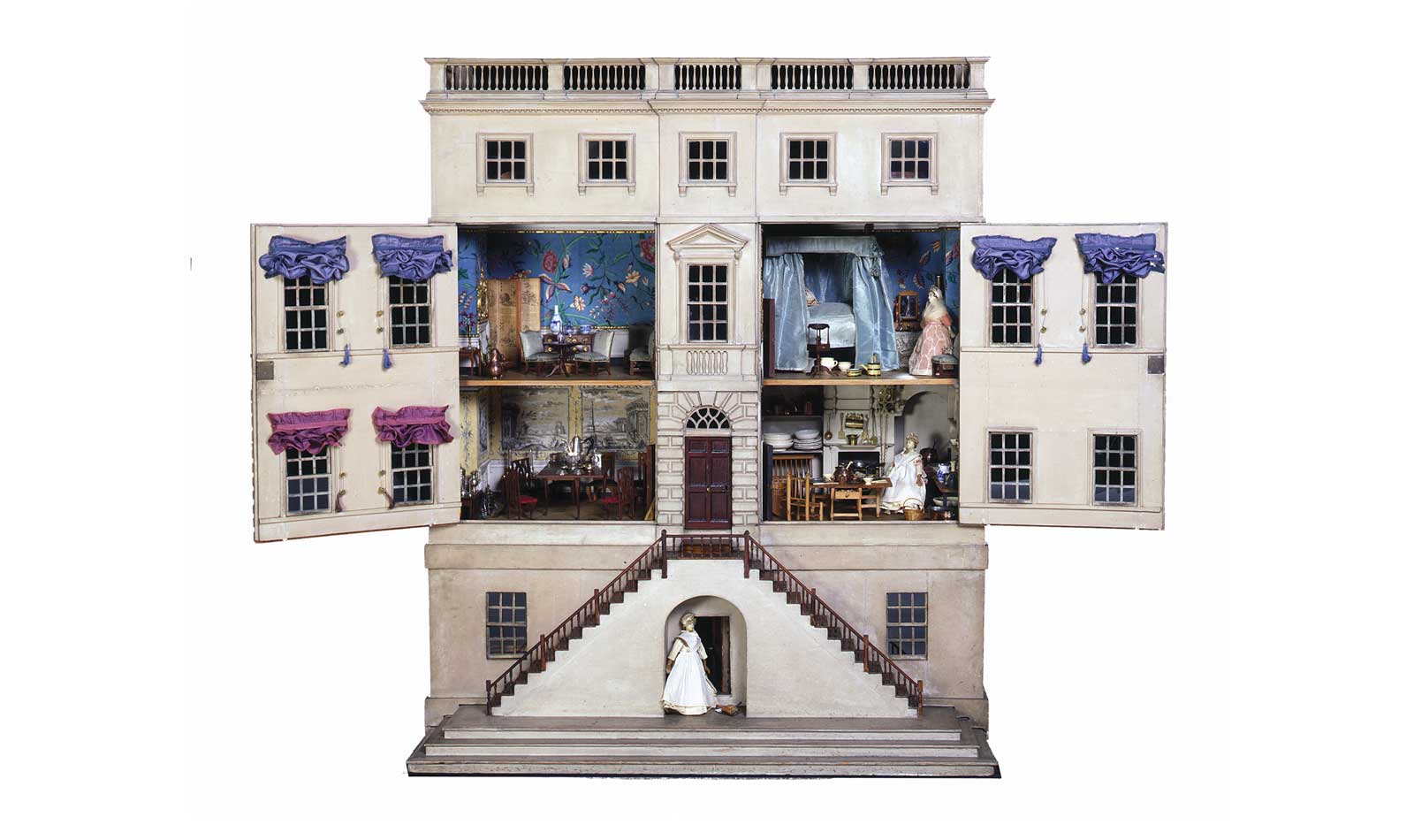 The wallpapers, fabrics and furniture of this dolls’ house show the lifestyle of a wealthy family.