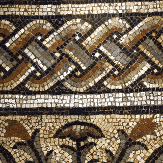 Animated GIF panning over a real Roman mosaic, panning over a criss-cross pattern and a design of some flowers.