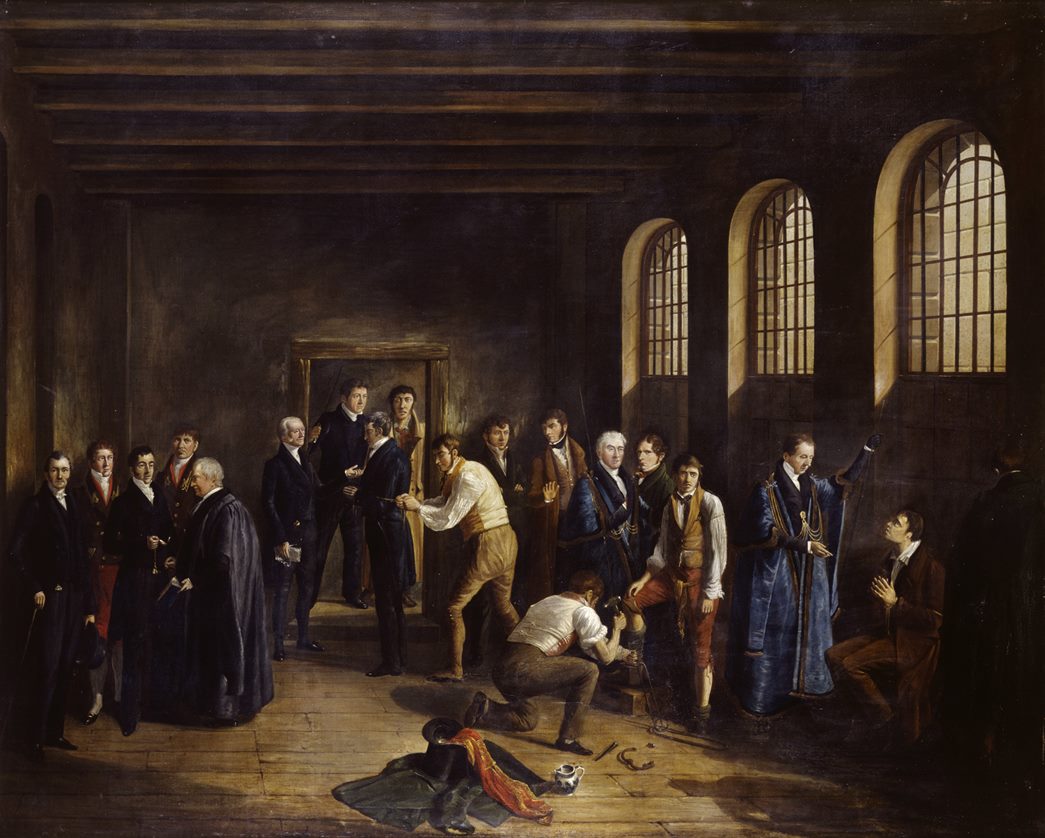 This painting by W. Thomson depicts Henry Fauntleroy (eighth from left) in the upper condemned cell at Newgate Prison. Fauntleroy was a partner in a banking firm Marsh, Sibbald and Co., who was convicted of forgery in 1824 and condemned to death. (ID no.: A28580)