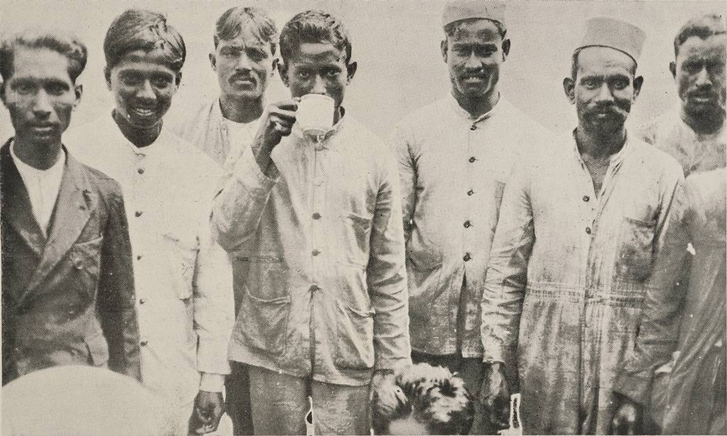 Asian seamen, known as Lascars, aboard their ship docked in the port of London. About 20,000 Asian and African sailors shipped in and out of London each year. On arrival they could stay for up to several weeks in the local seamen's lodging houses, before boarding a return passage. By 1903 there were over 100 seamen's lodging houses in London’s docklands providing accommodation for up to 2,000 sailors. (ID no.: 010272)