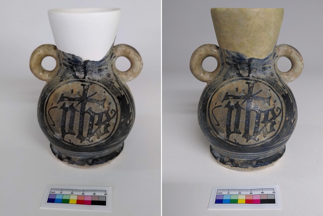 A medieval two-handled vase with a completely reconstructed neck and rim, retouched in a neutral colour. (ID no.: A378)