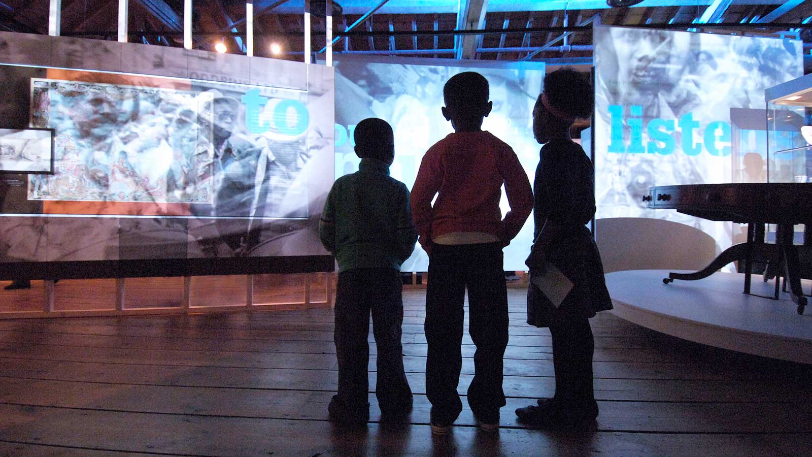 Children inside the London, Sugar & Slavery gallery at Museum of London Docklands