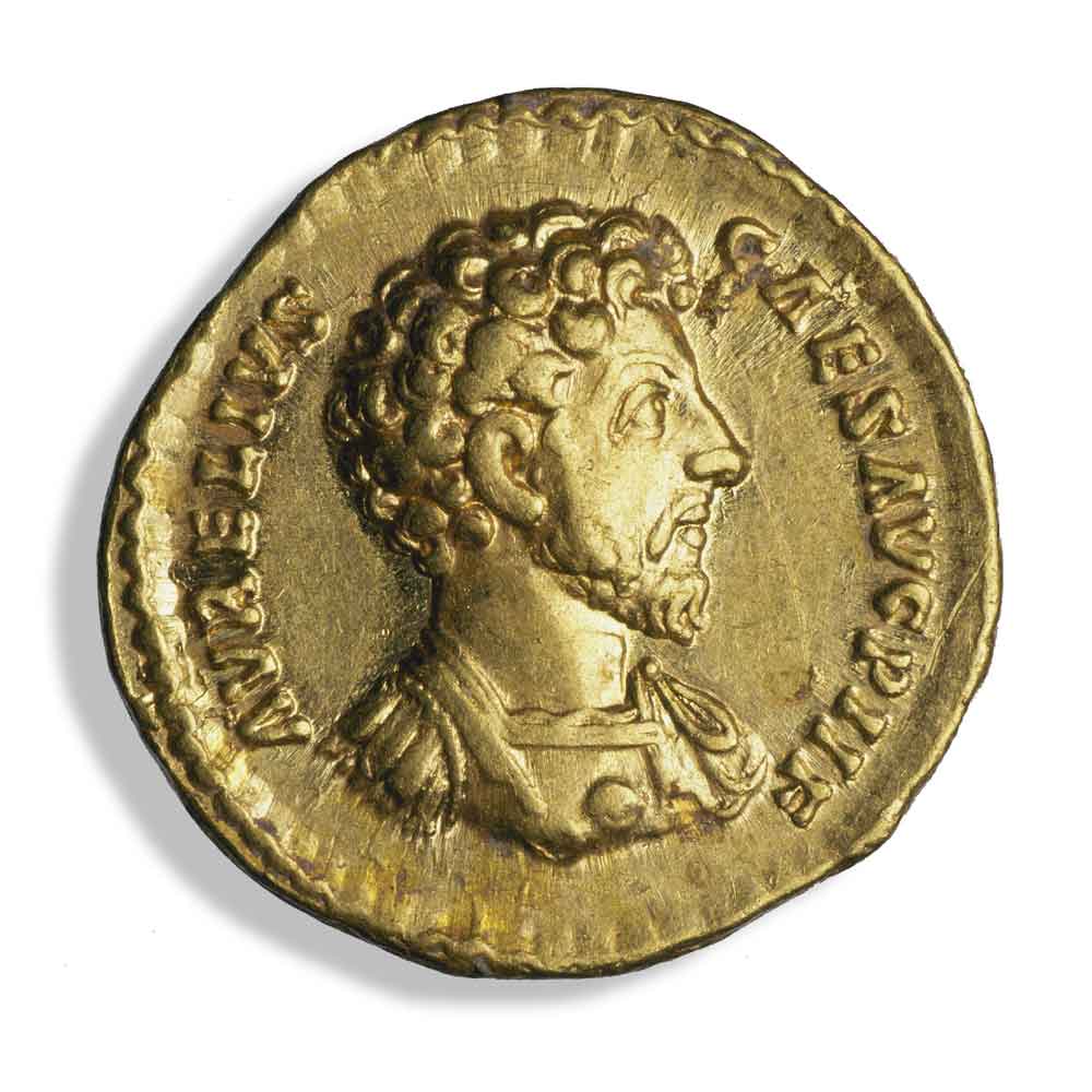 This gold coin depicts a bareheaded emperor who is facing to the right.  