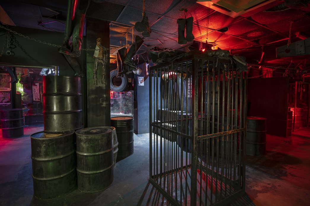 The decor was a huge part of the club’s distinctive experience, including the boots, posters and the cage at the centre.