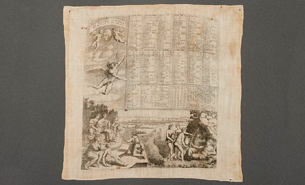 The Oxford Almanack has been published annually at the University of Oxford since 1674. The almanacs traditionally included engravings and information about the academic year, as seen on this handkerchief. It is one of the earliest known handkerchiefs to have survived. (Id no.: 2015.15/4)