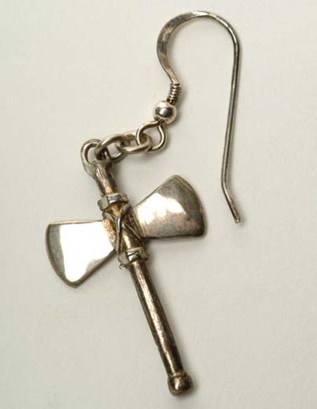 This silver earring is in the shape of a double-headed axe called a labrys. It is believed to have been used as a tool by a number of ancient civilizations for the dual purpose of fighting and harvesting. 