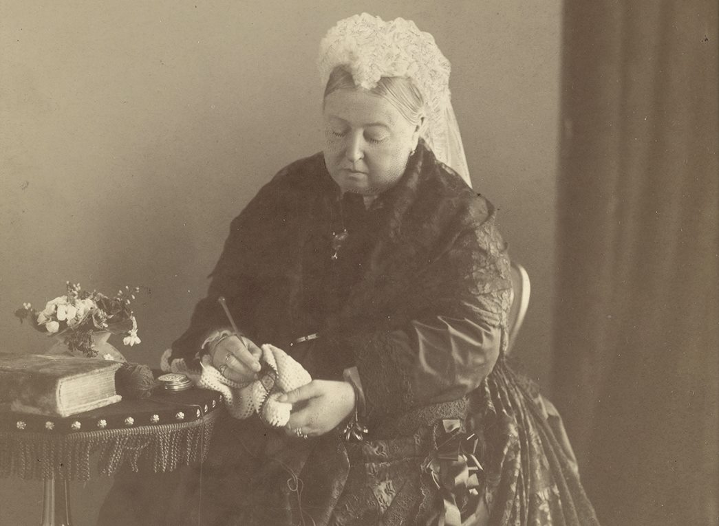 Queen Victoria crocheting, 1889
Cabinet print. Full length portrait of Queen Victoria seated, looking down whilst she crochets using a knitting needle. Photographer: Byrne & Co. (Courtesy Royal Collection Trust / © His Majesty King Charles III 2023)
