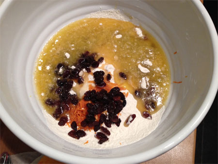 Add the melted mixture to orange zest and raisins