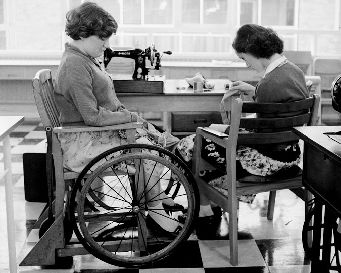 Two pupils concentrate on their sewing work at the Franklin D Roosevelt School in 1957. (ID no: HG1792/15 ©Henry Grant Collection/Museum of London)