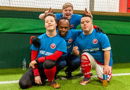 The north london united footballers with down's syndrome having fun posing. 