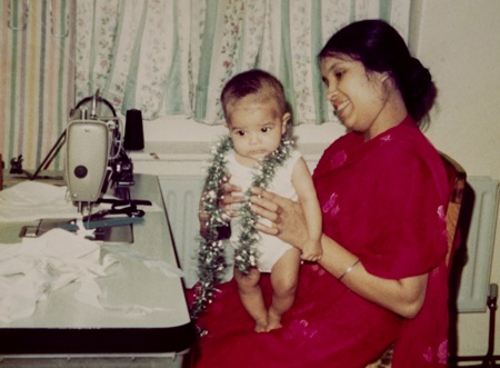 Anwara Begum, with the author, sitting next to her sewing machine at their home in 1982. (Courtesy: Asma Begum)