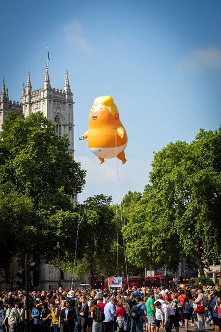 Trump Baby flying over Parliament square. Photo by Andy Aitchison. Copyright Andy Aitchison