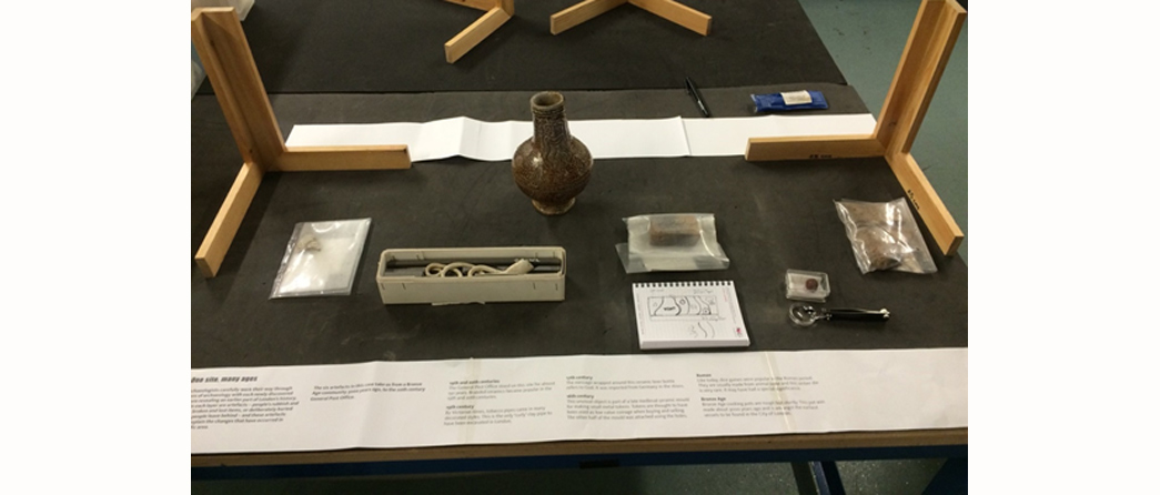 The objects for the Delivering the Past exhibition laid out.