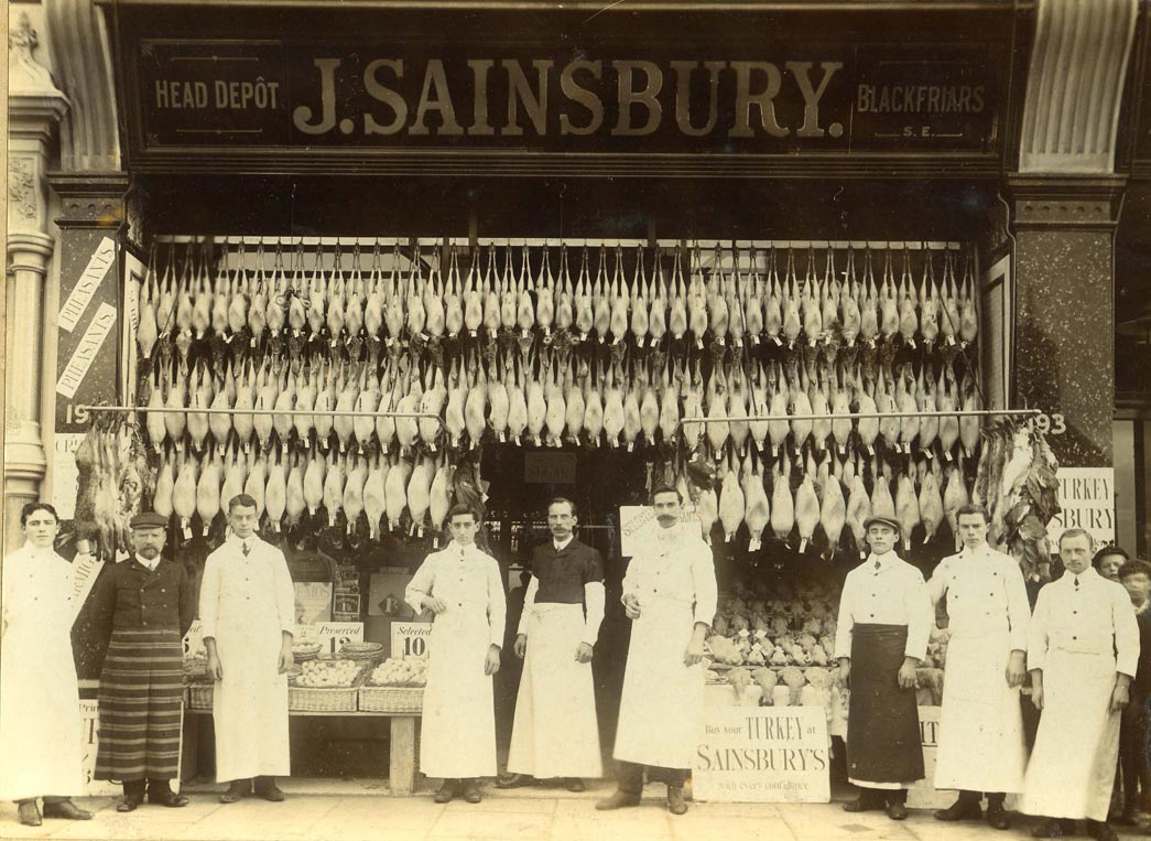 Photograph of 193 Rushey Green, Catford branch with Christmas game and poultry display, 1902-1920s. Copyright Sainsbury's Archive.
