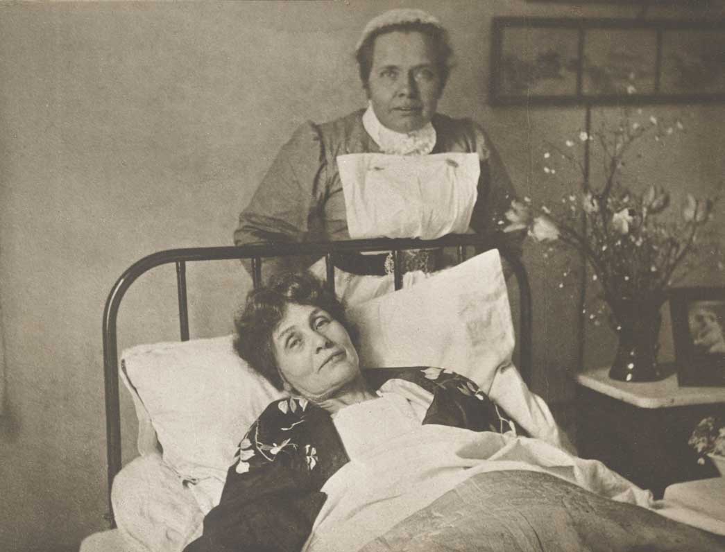 Emmeline Pankhurst with Nurse Pine on her release from prison and hunger strike. On 3rd April 1913 Emmeline Pankhurst was sentenced to three years penal servitude for incitement to place an explosive in a building at Walton, Surrey. 