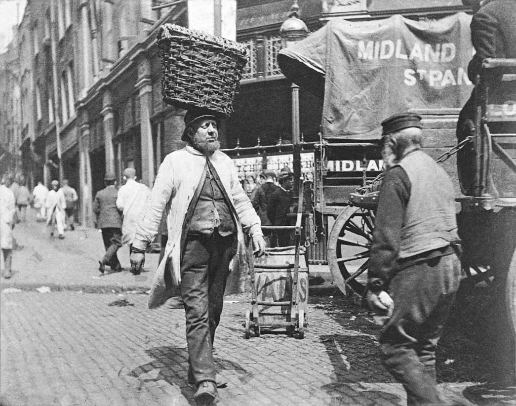 A fish porter at Billingsgate in 1893. Photographed by Paul Martin.