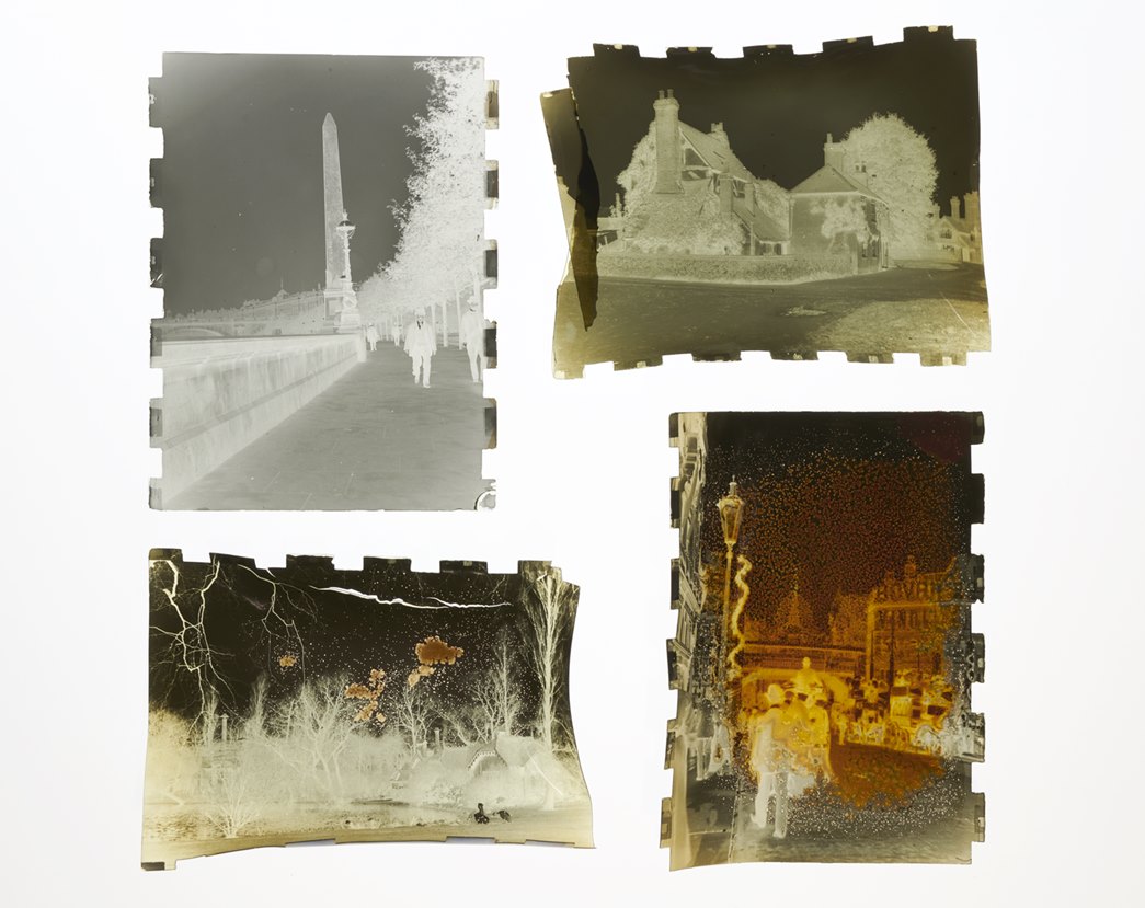 The first is an undamaged negative; the top-right is brittle and splintered; the bottom-left has curled, brittle and has start to change colour; and the next has more areas of changing colour. (©Museum of London)