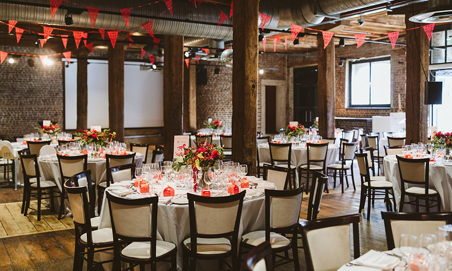 A dinner set up at Museum of London Docklands, as part of the venue hire offer